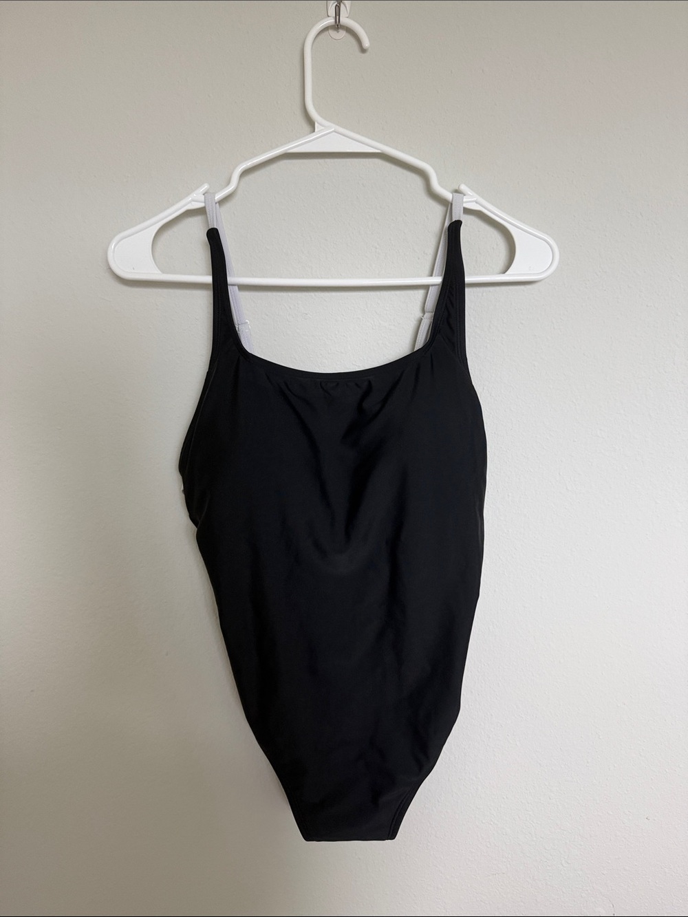 Black One-Piece Swimsuit with White Accent Details